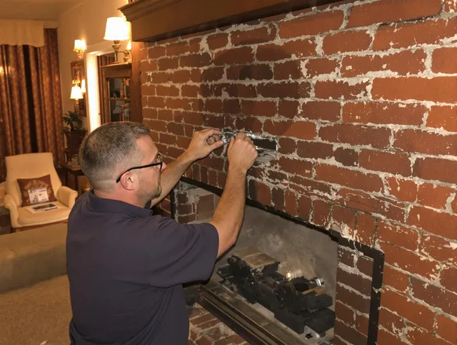 Rancho Cucamonga Chimney Sweep expert fixing a fireplace in Rancho Cucamonga, CA